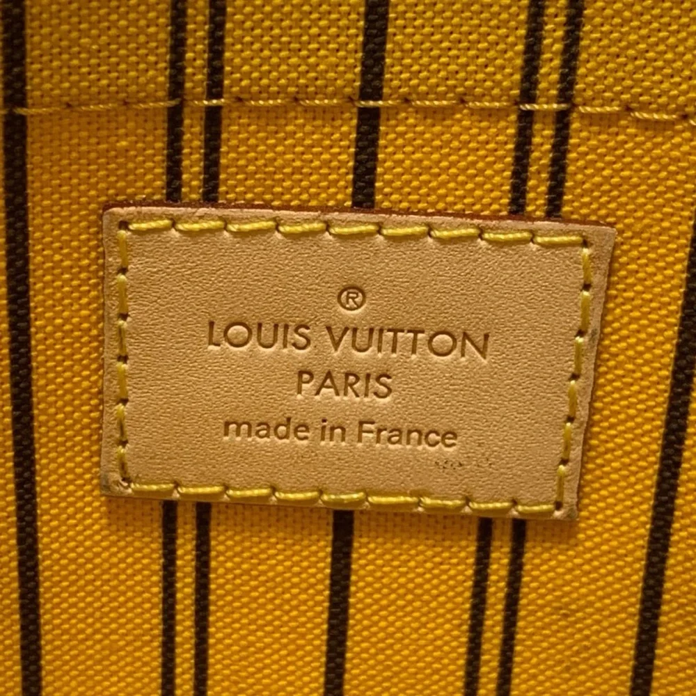 Authentic Louis Vuitton mimosa yellow lining Neverfull GM pouch wristlet